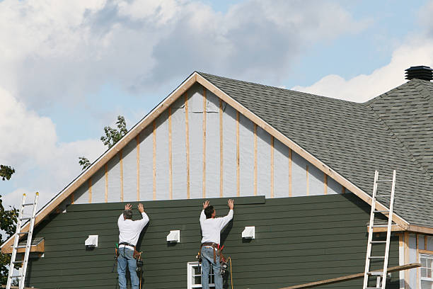 Professional Siding Contractor technician working in Bunnlevel, NC